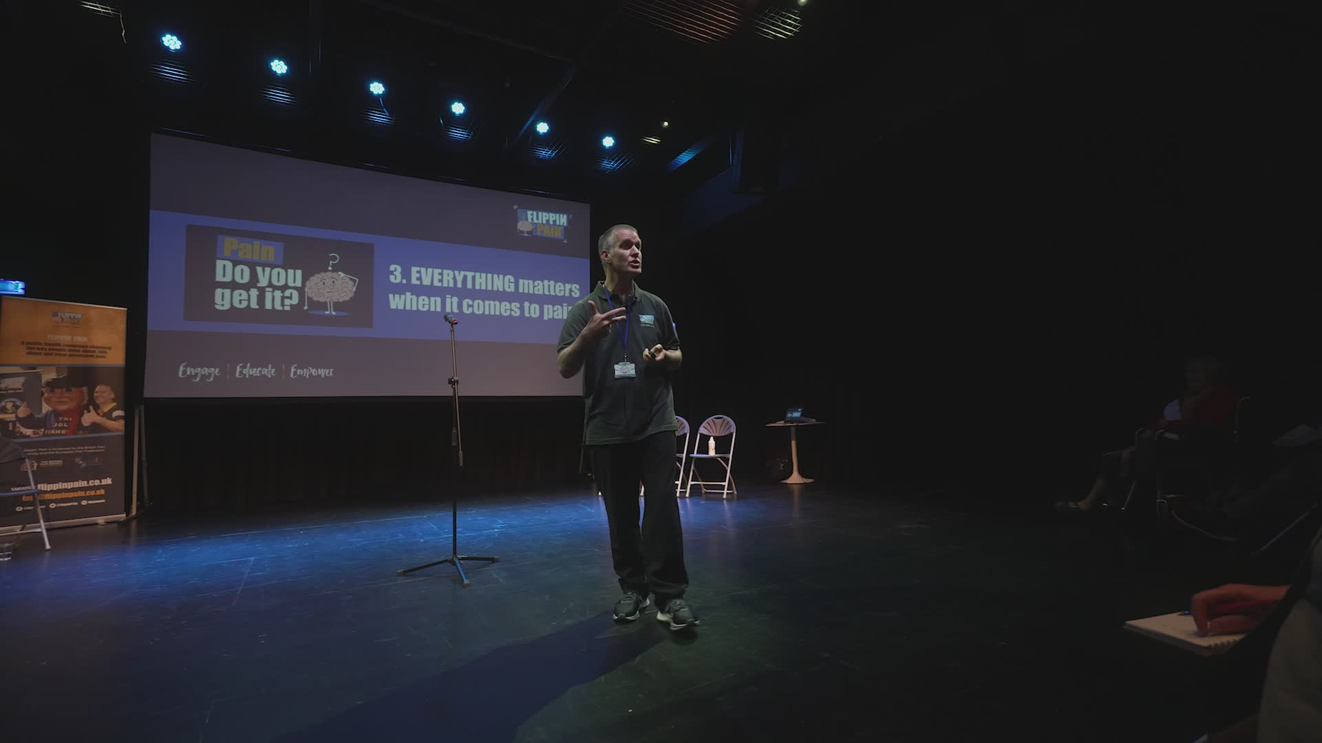 Professor Cormac Ryan presenting in front of a screen.