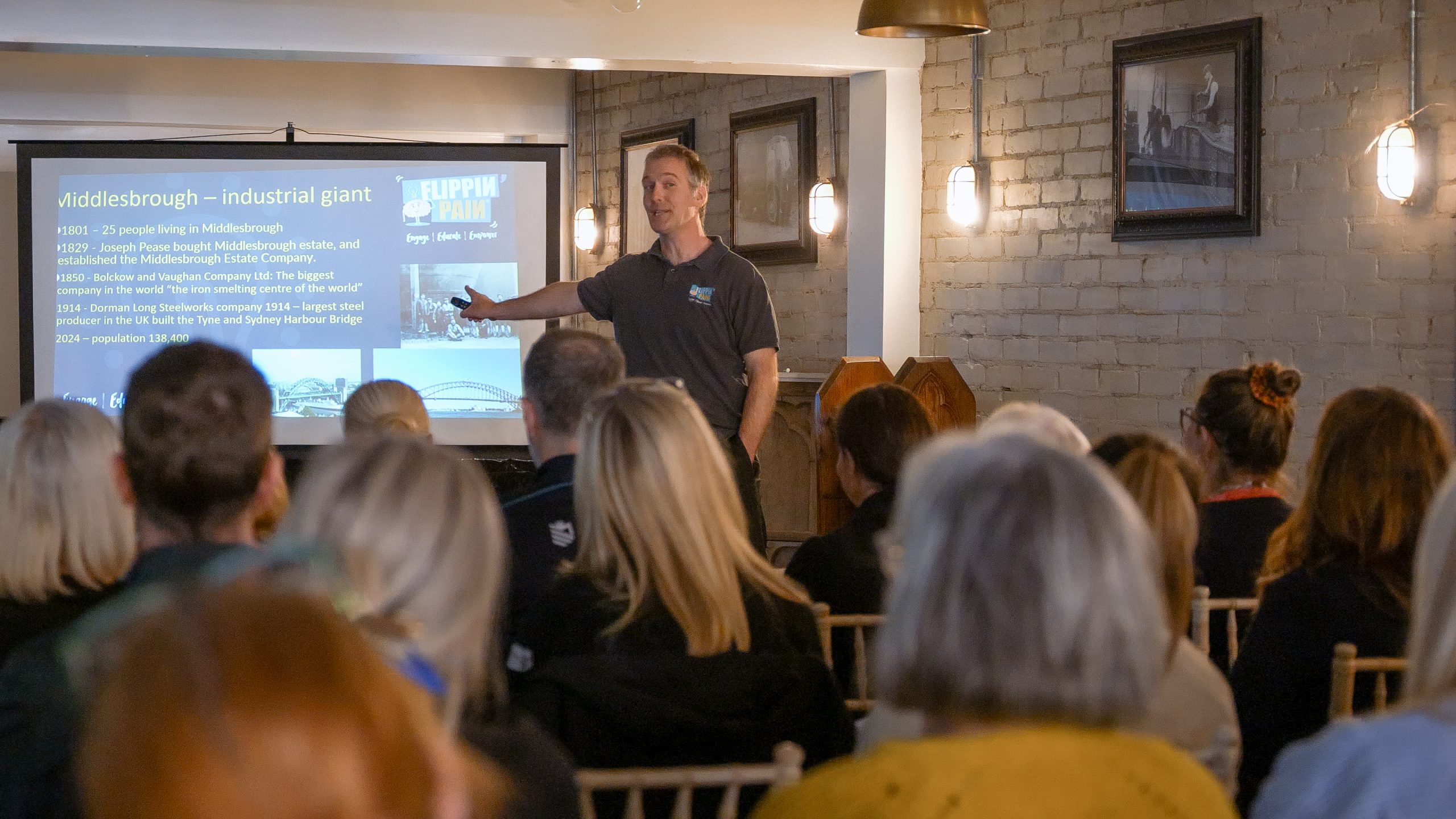 Professor Cormac Ryan presenting in front of a PowerPoint